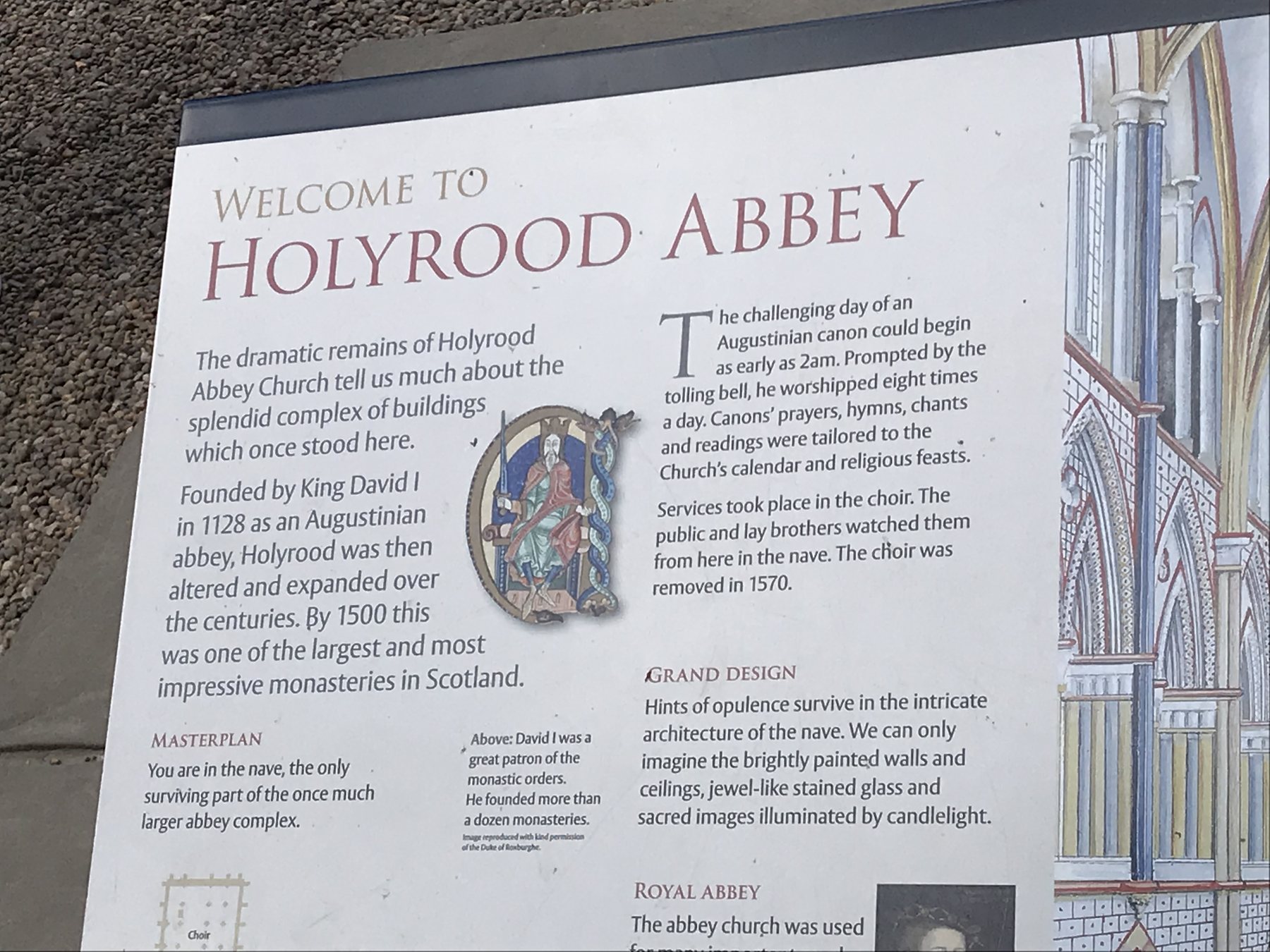 Visitor sign explaining the history and architecture of Holyrood Abbey