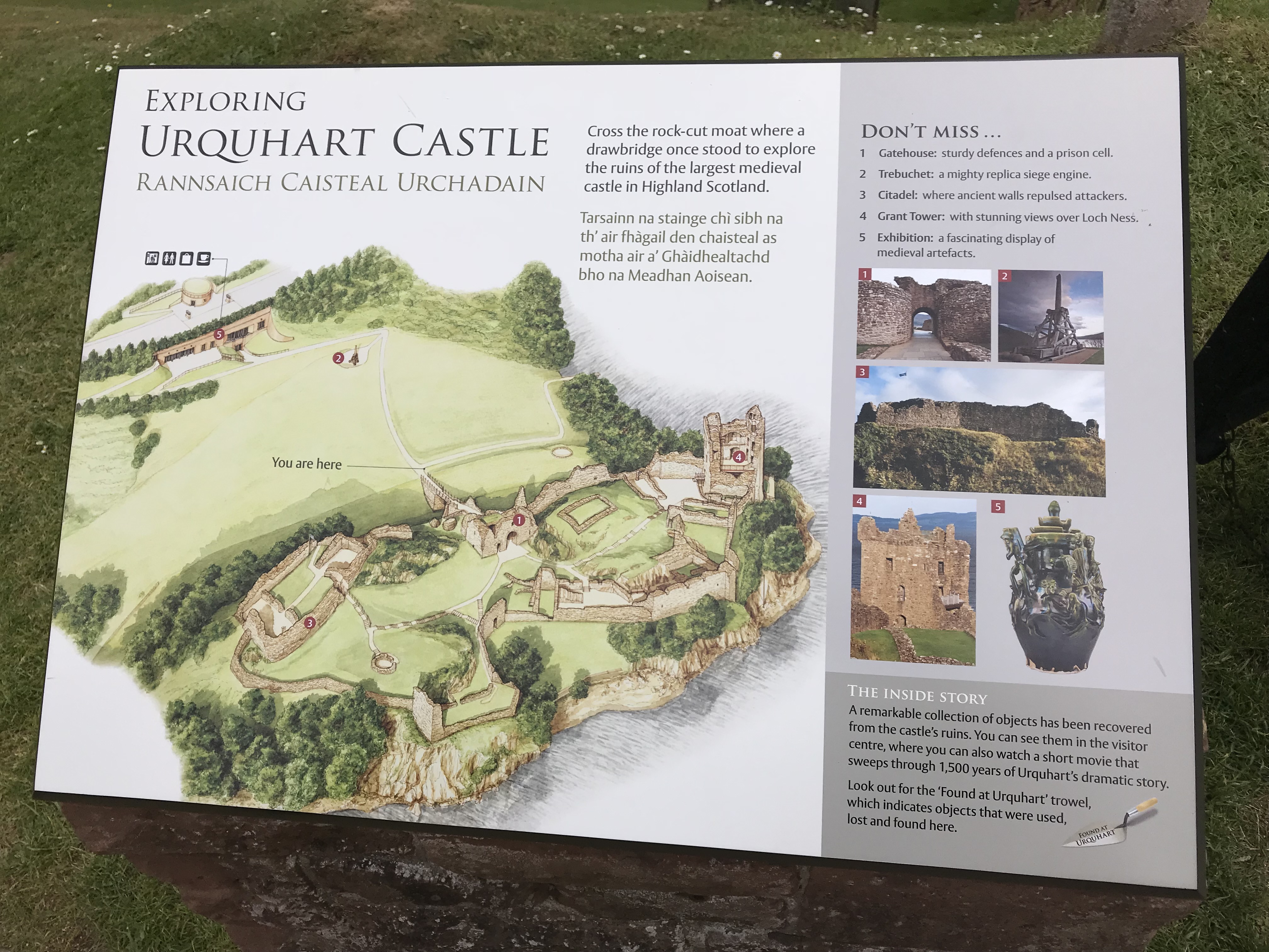Ruins of Urquhart Castle above the water of Loch Ness