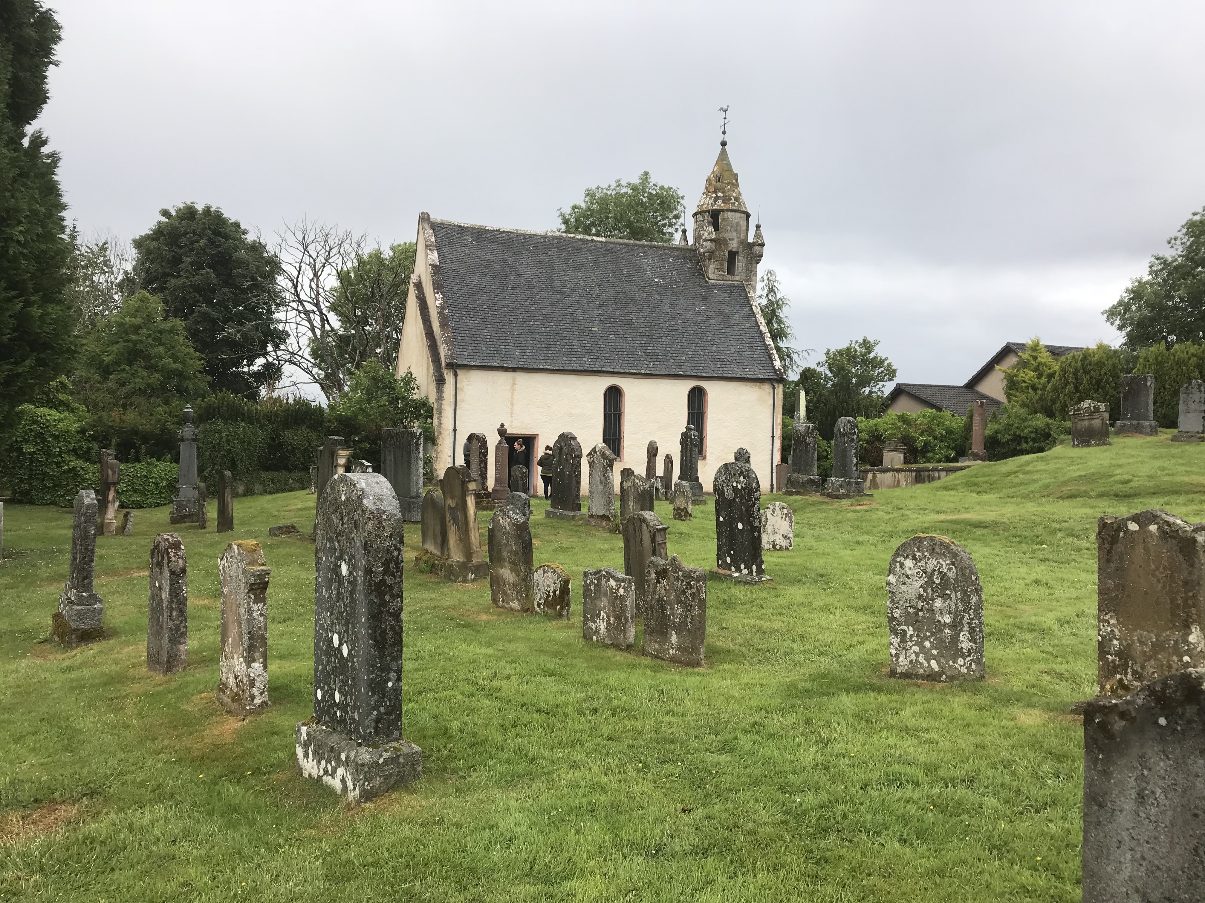 Stone exterior of Wardlaw Mausoleum in its quiet churchyard