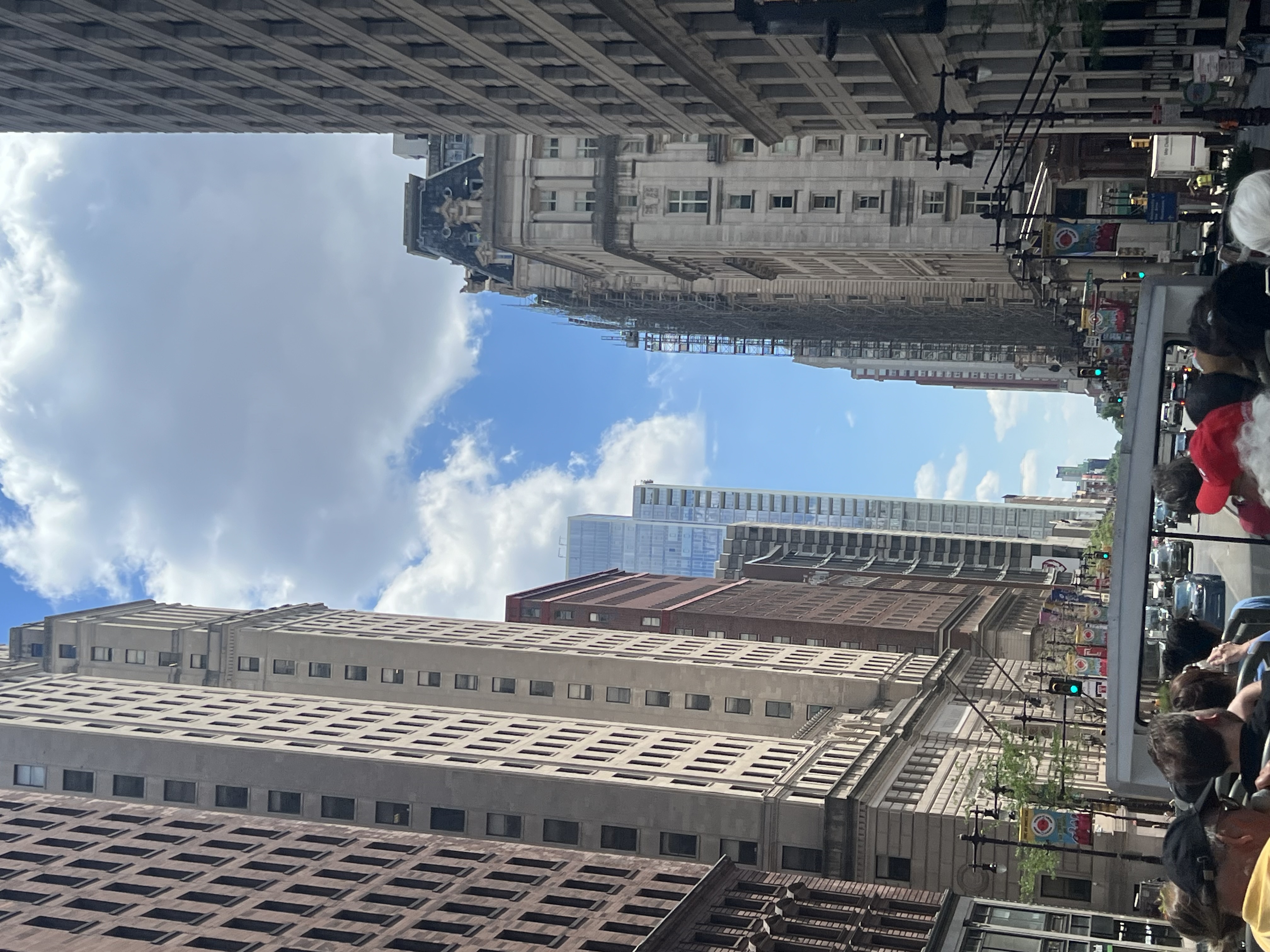 Downtown Philadelphia street seen from the open top deck of a sightseeing bus