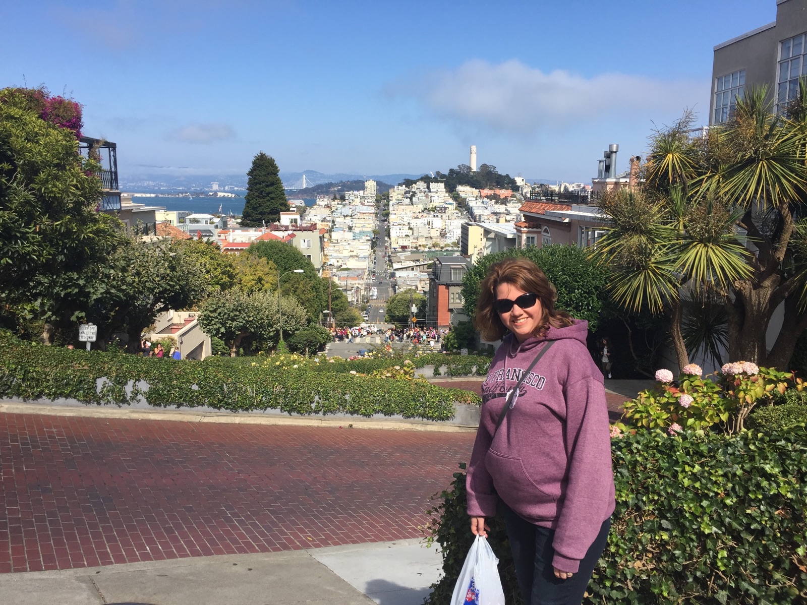 Angela standing at the top of Lombard Street in San Francisco