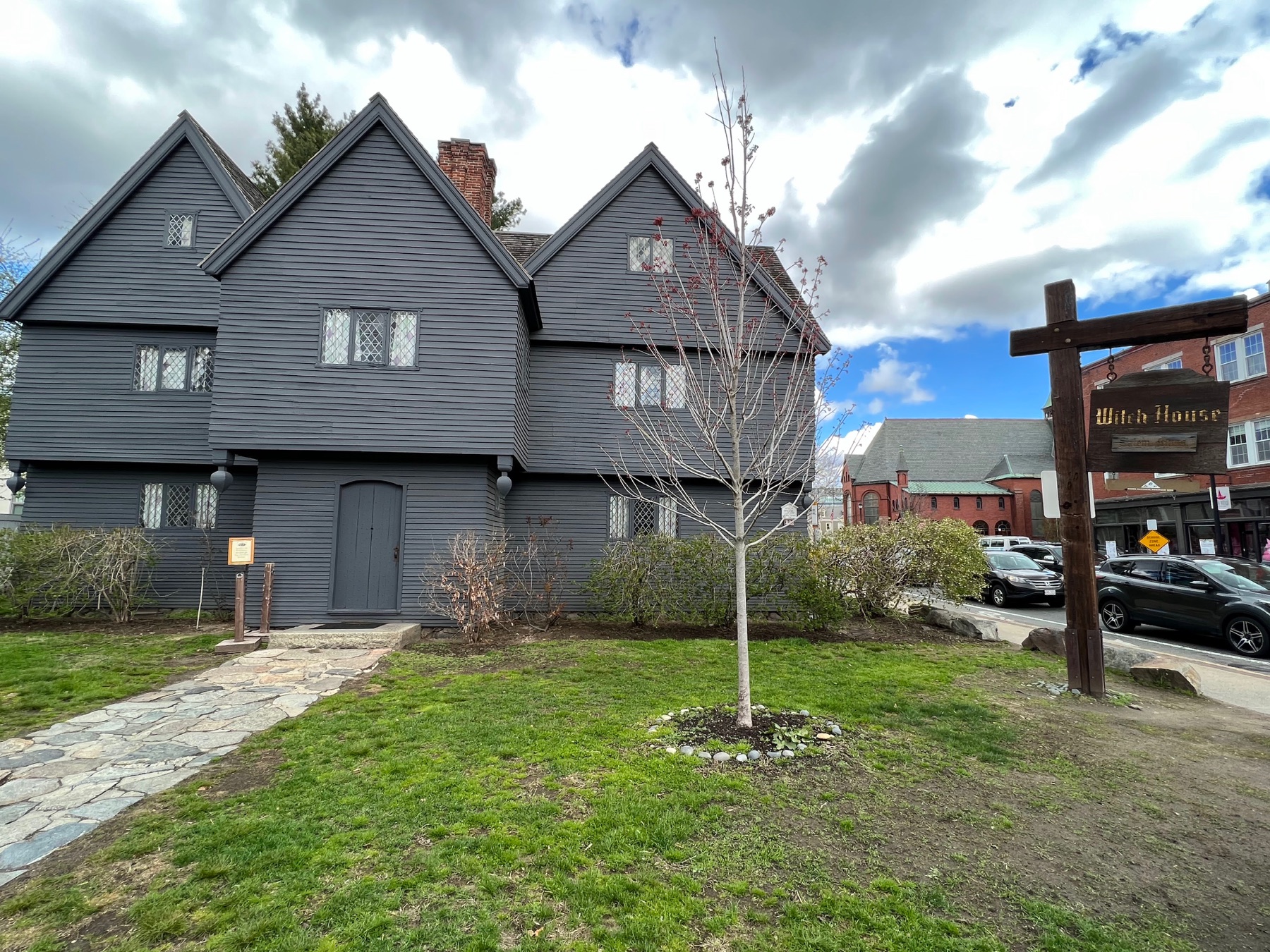 The dark timbered exterior of the Witch House in Salem