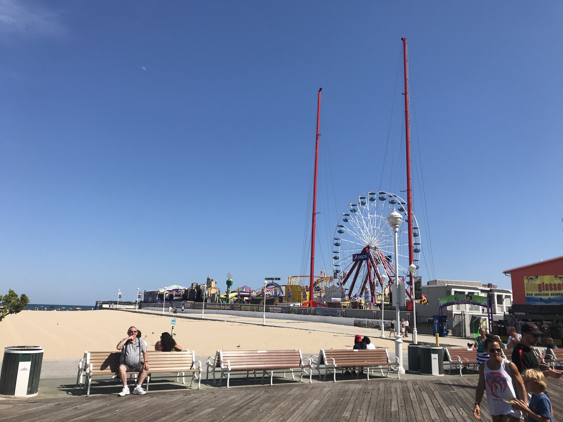 The Giant Wheel and tall amusement rides at Jolly Roger at the Pier beside the Ocean City Boardwalk