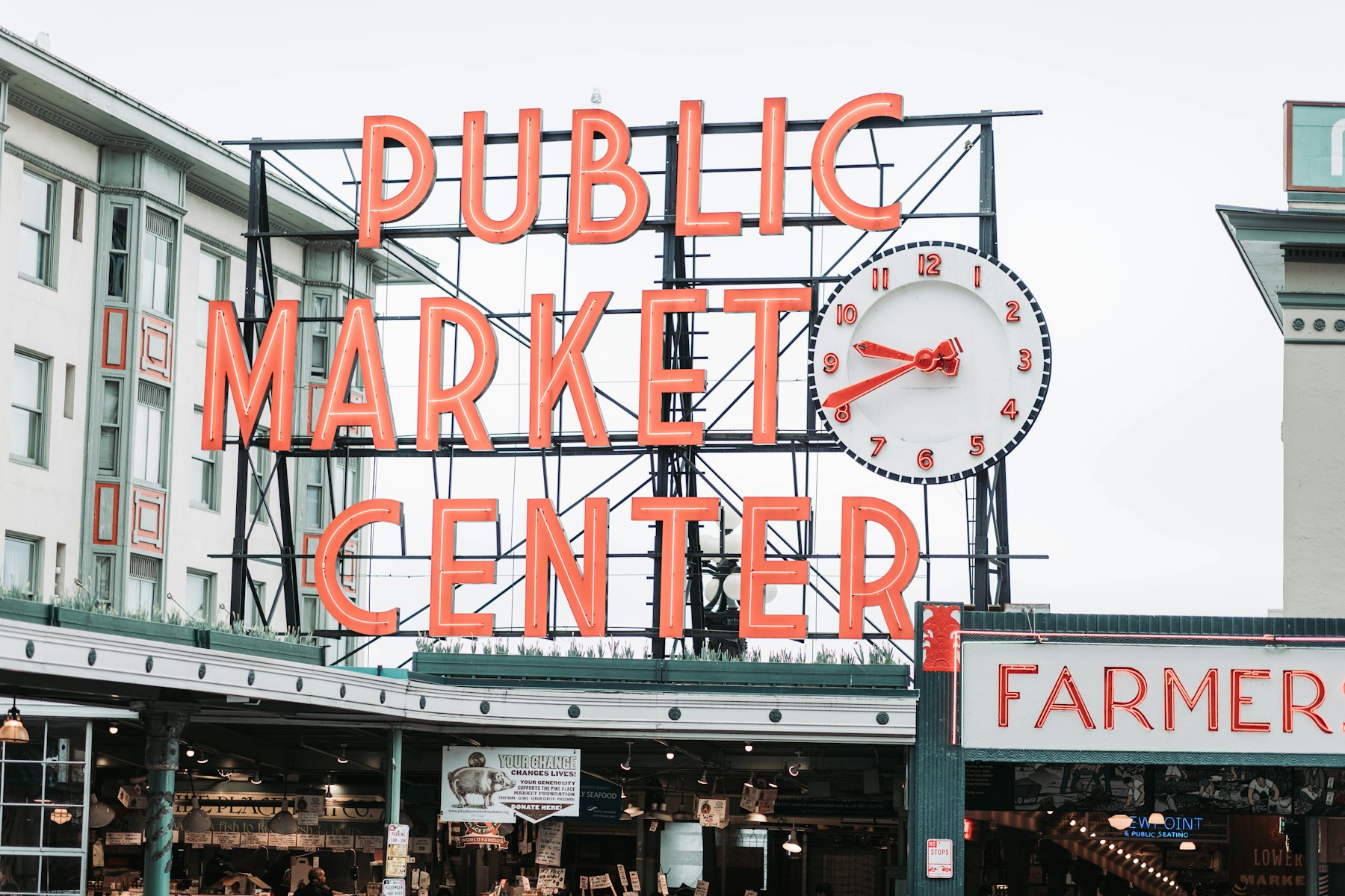 The illuminated Public Market Center sign at Pike Place Market in Seattle