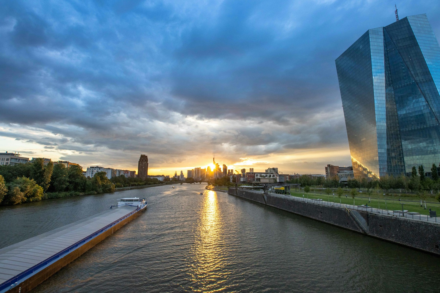 Frankfurt skyline at sunset reflected in the Main River