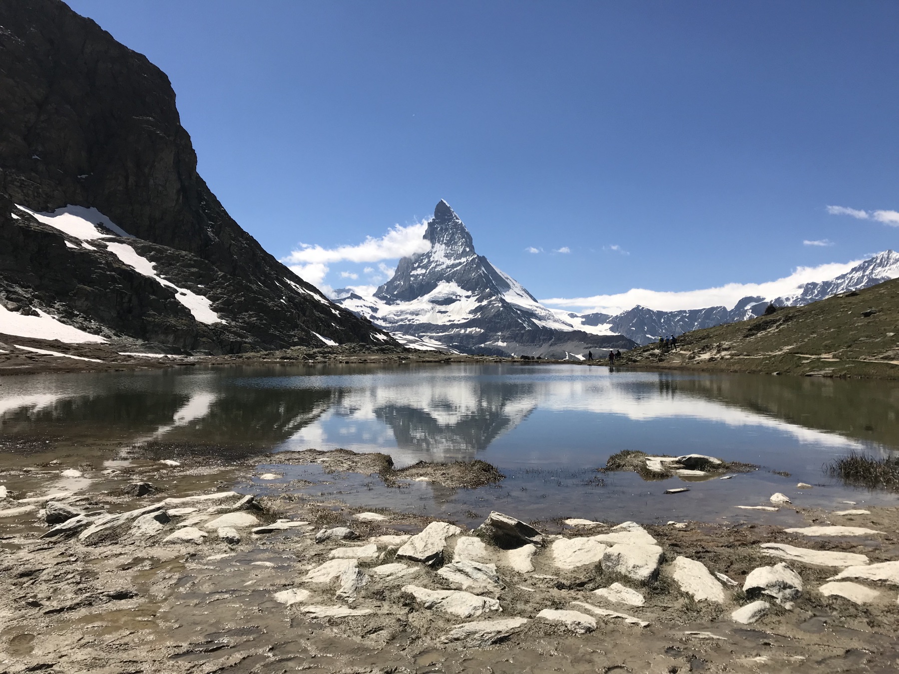 The Matterhorn reflected in a small alpine lake along the Gornergrat route