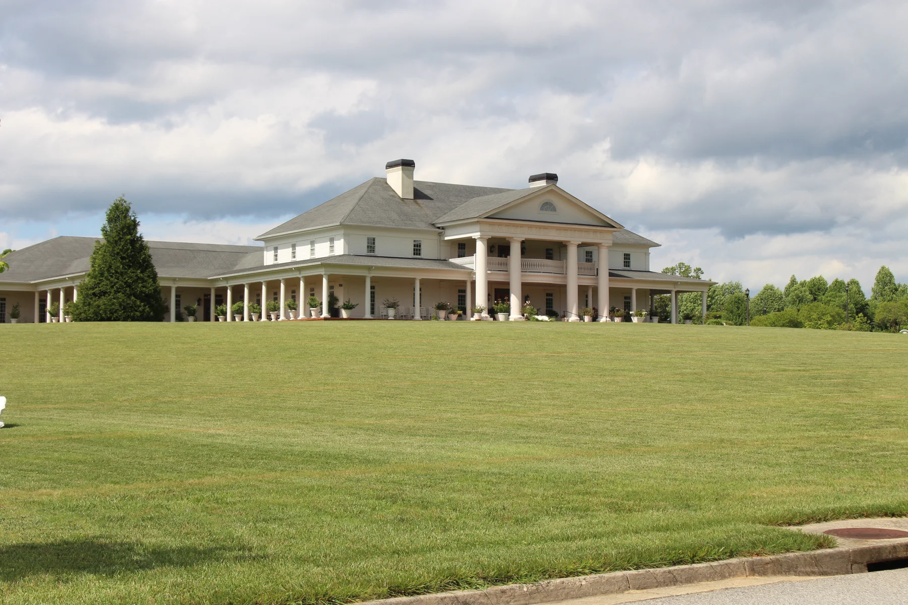BabyLand General Hospital’s large white building with a columned entrance and broad lawn in Cleveland, Georgia