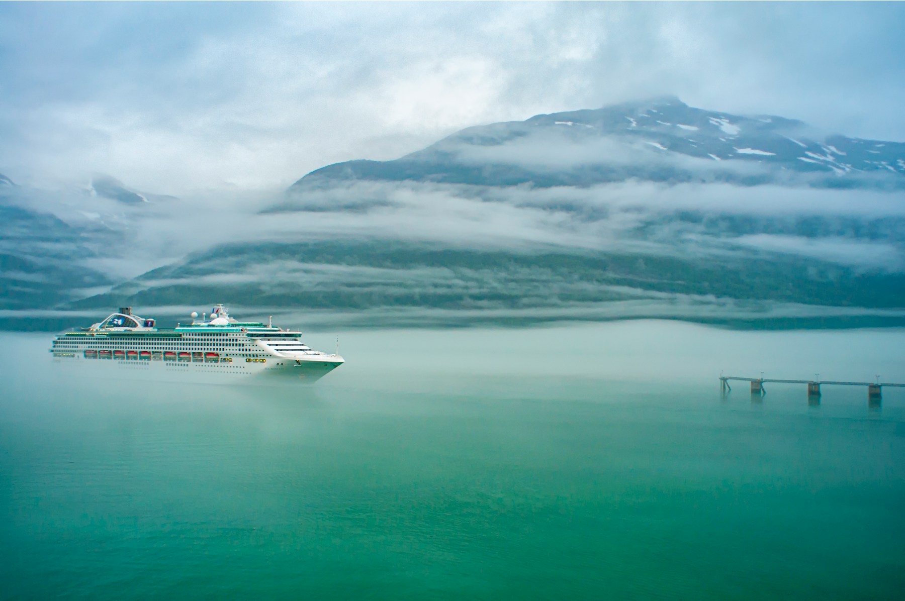 A cruise ship sailing through Alaska