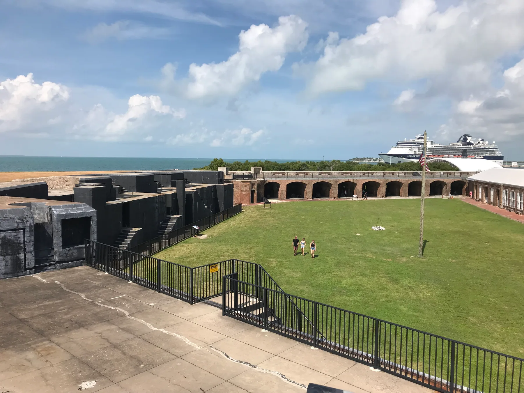 Fort Zachary Taylor courtyard, brick arches, and gun emplacements with the sea beyond