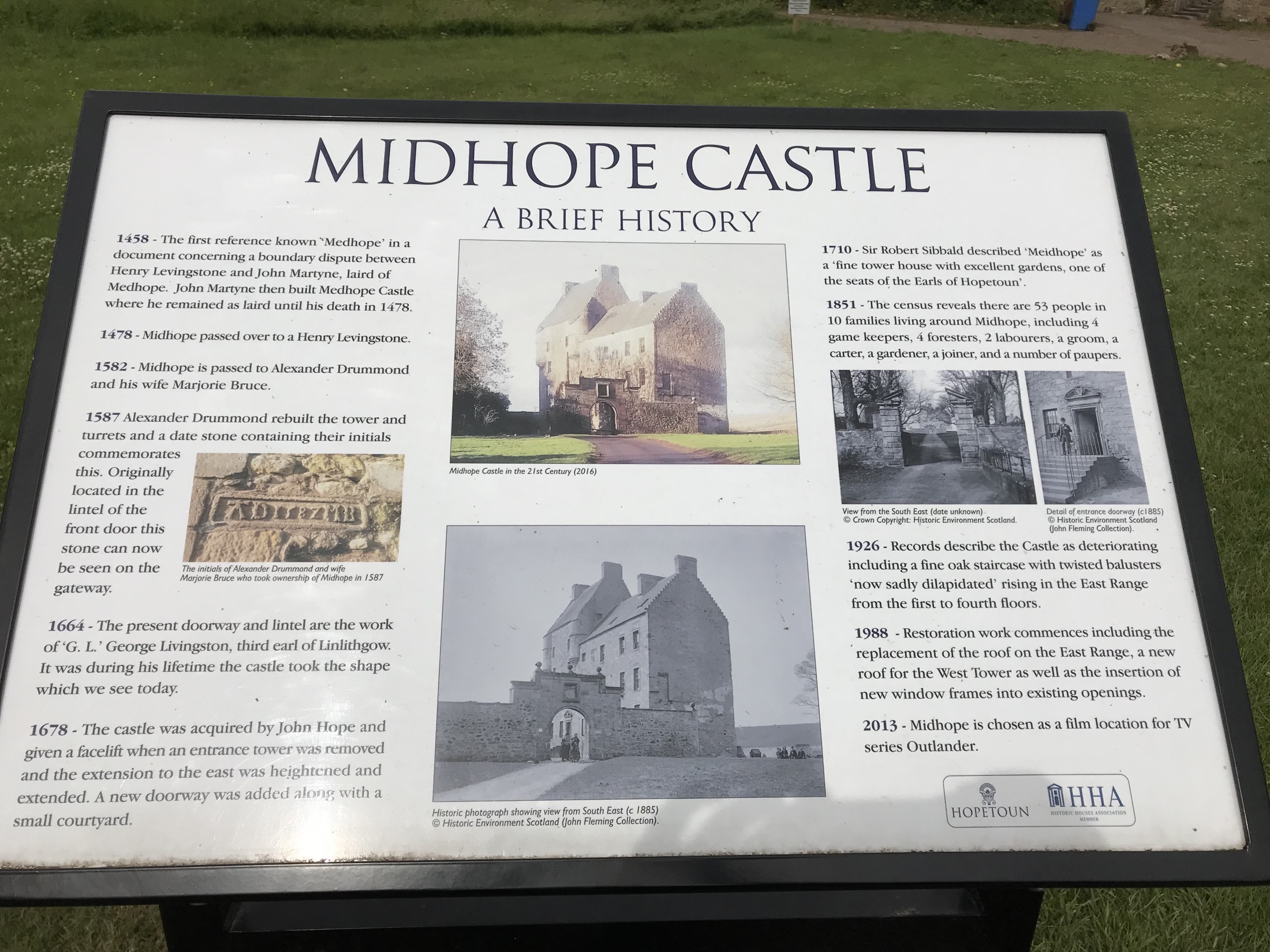 An outdoor history panel describing the development of Midhope Castle