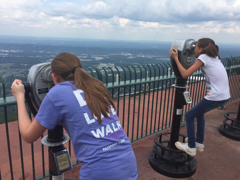 Angie’s daughters looking through viewing scopes from Lookout Mountain near Chattanooga, Tennessee