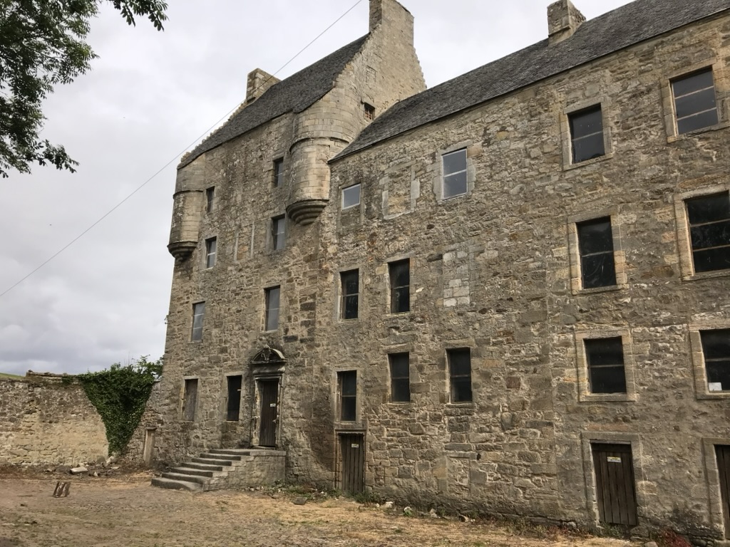 The stone exterior and courtyard side of Midhope Castle