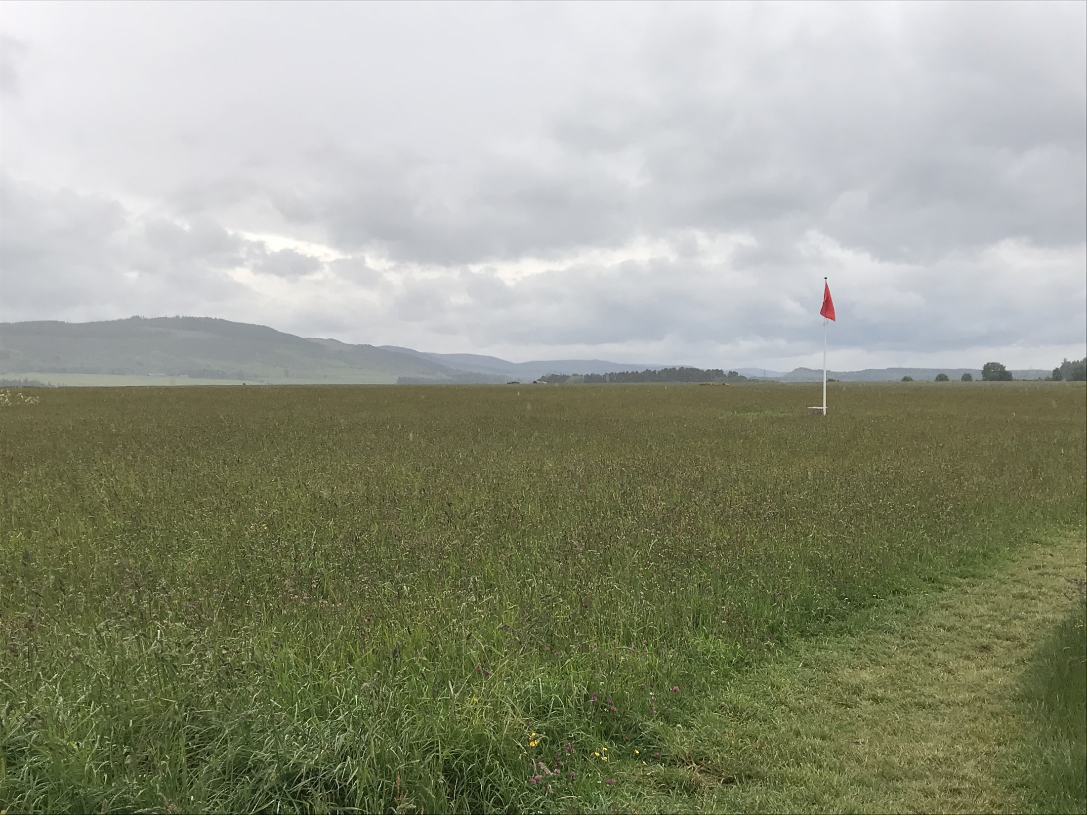 Open moorland and memorial stones at Culloden Battlefield