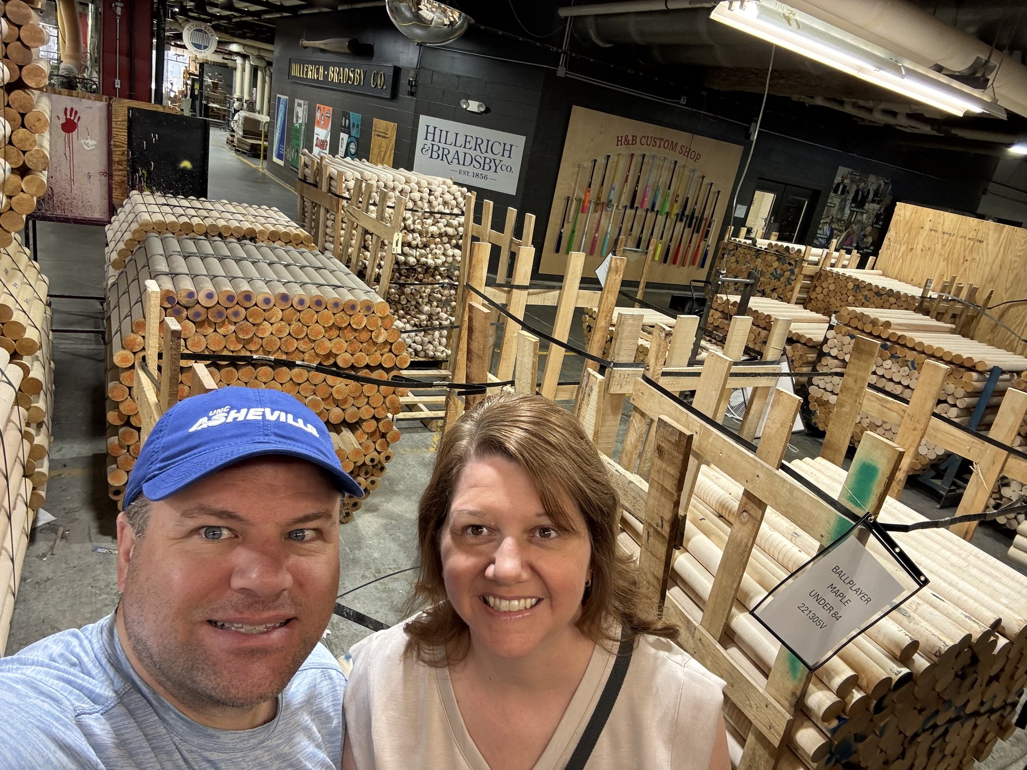 Angela and Brian inside the Louisville Slugger bat factory