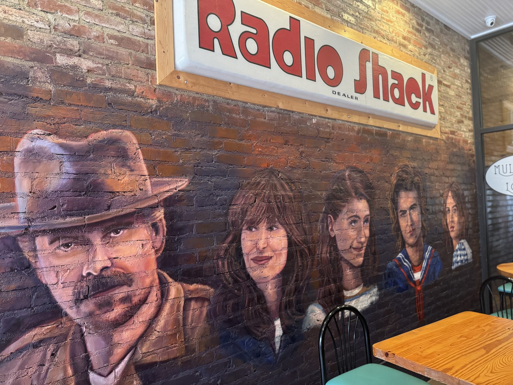 A Stranger Things character mural painted on a brick wall in Jackson, Georgia