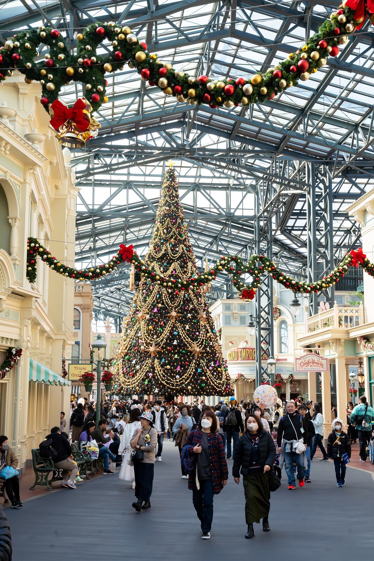 The glass-roofed World Bazaar decorated for the holidays at Tokyo Disneyland