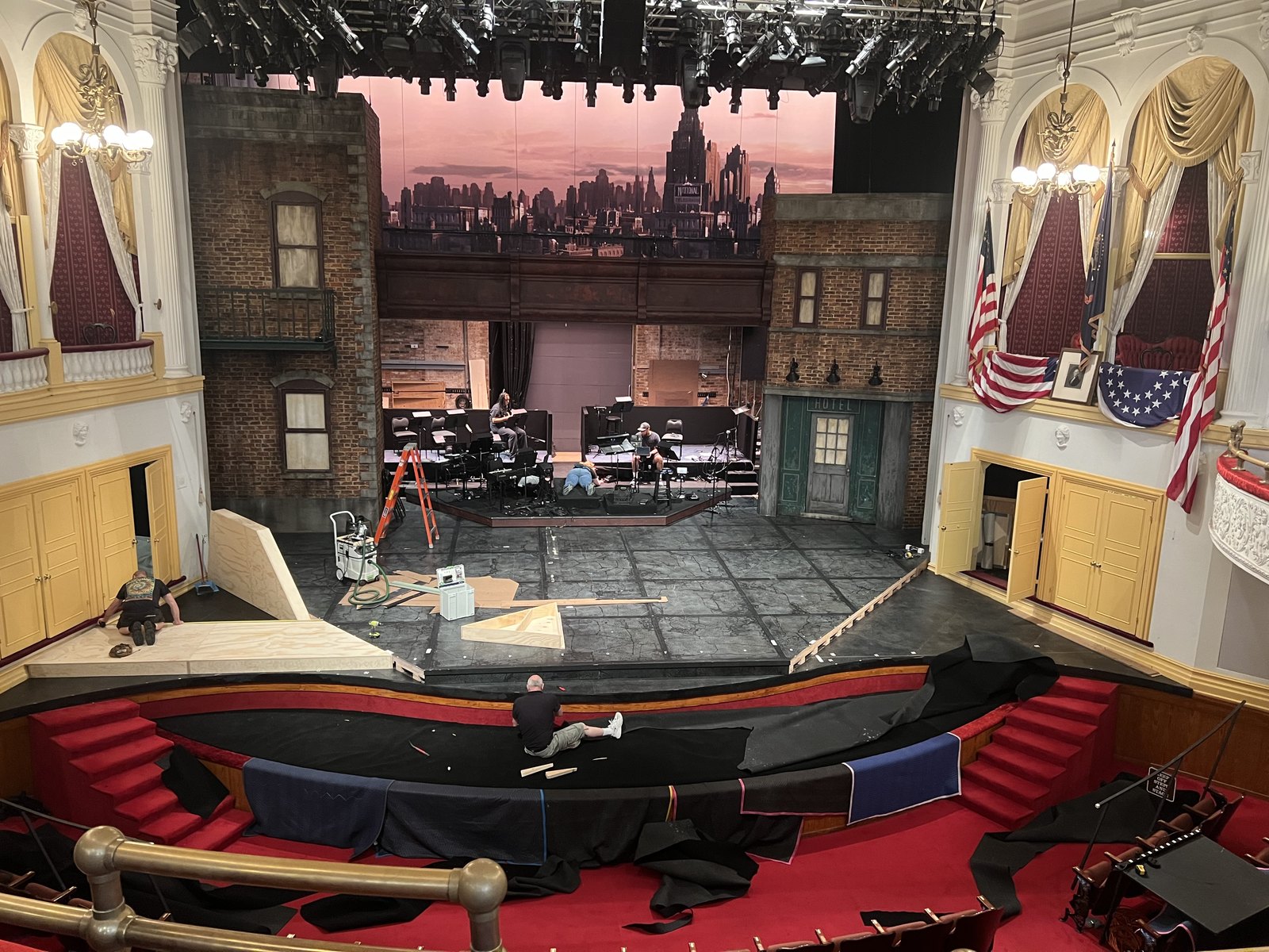The compact Ford’s Theatre auditorium and stage viewed from the balcony while a production set is being installed